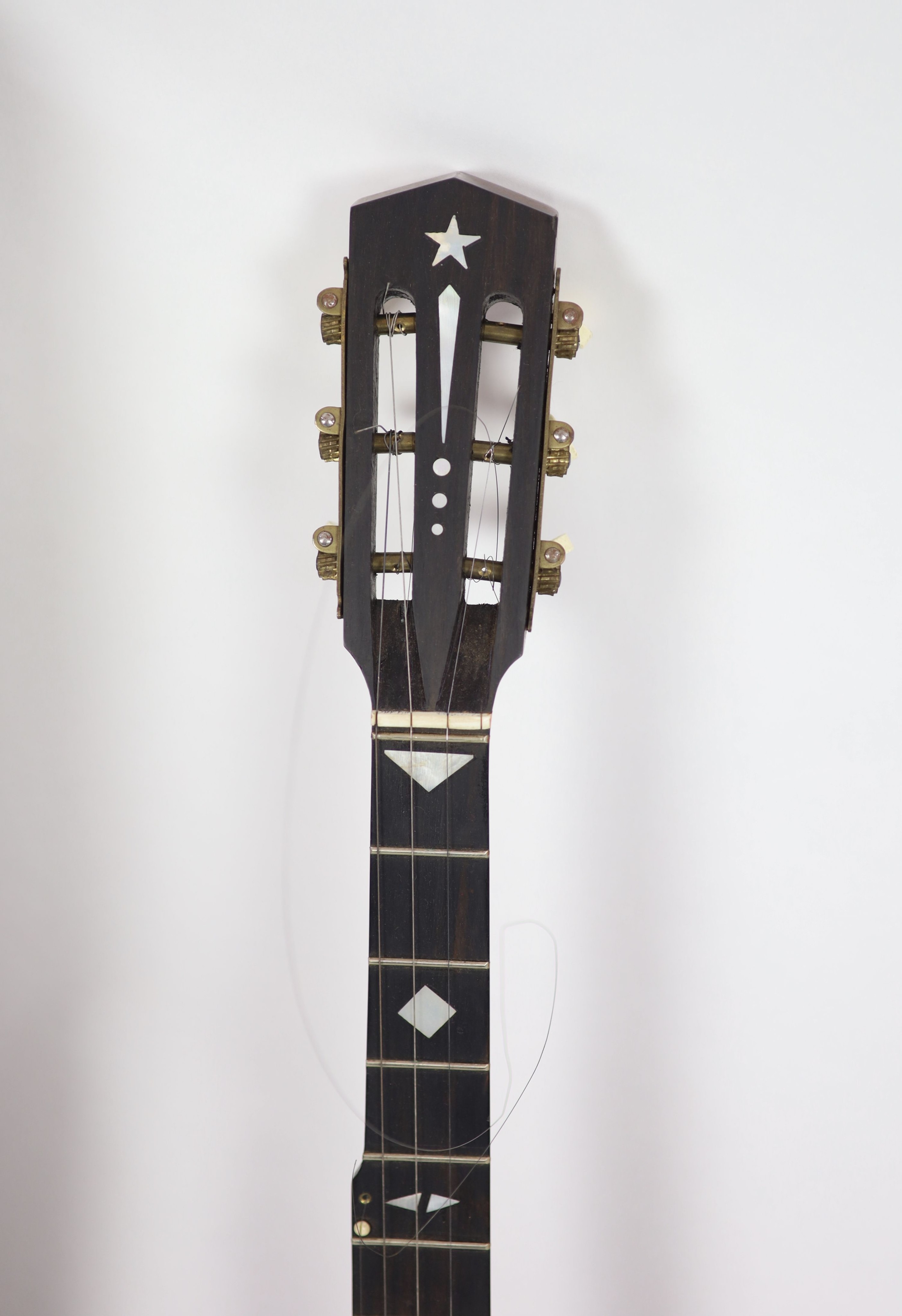 A Clifford Essex inlaid ebony banjo, overall length 94cm, with distressed leather case